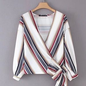 Blouse- stripped tie around or in the front.